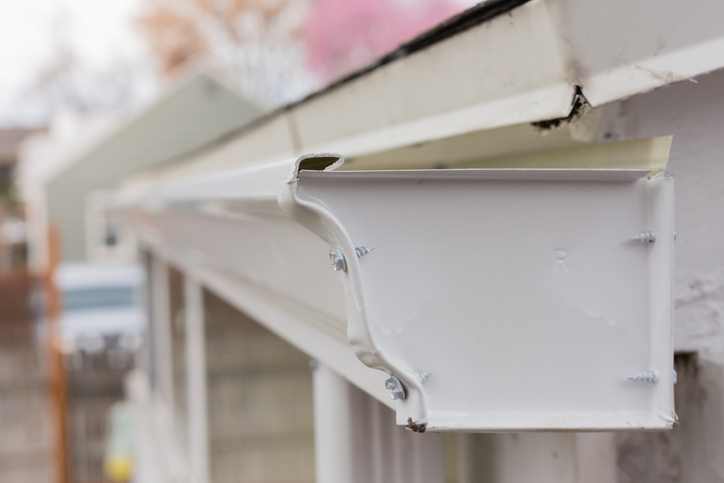 How do I properly space gutter hangers?